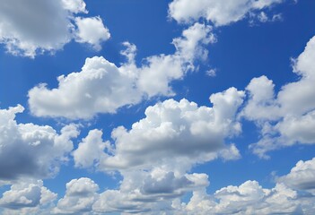 Vibrant blue sky with fluffy clouds.