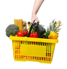 Woman holding shopping basket with different food products on white background, closeup