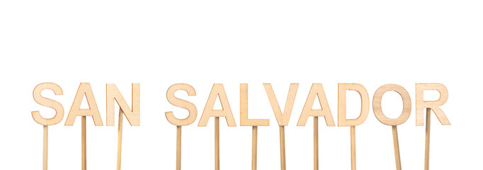 Text forming the name of San Salvador, capital of El Salvador, in light wooden letters on white background