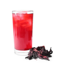 Delicious hibiscus tea with ice cubes in glass and dry roselle sepals isolated on white