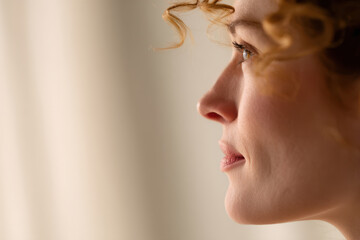 portrait of tourism expert inspired expression positioned on left side of frame