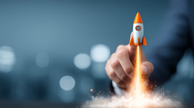 Businessman touching on rocket launch with up arrow, investment growth, planning and starting corporate business start up aiming objective value development leadership and customer target group