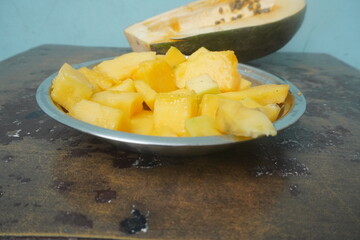 Papaya is a tropical fruit with sweet, orange flesh, rich in vitamins, enzymes, and antioxidants, promoting digestion and health.