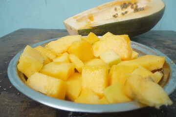 Papaya is a tropical fruit with sweet, orange flesh, rich in vitamins, enzymes, and antioxidants, promoting digestion and health.