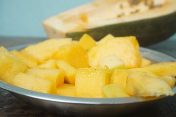 Papaya is a tropical fruit with sweet, orange flesh, rich in vitamins, enzymes, and antioxidants, promoting digestion and health.