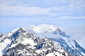 Obraz premium Snowcapped mountain by winter in French alps.