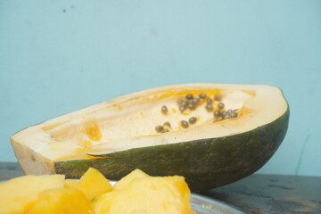 Papaya is a tropical fruit with sweet, orange flesh, rich in vitamins, enzymes, and antioxidants, promoting digestion and health.