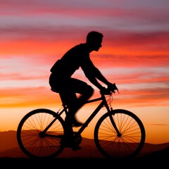 Fototapeta premium silhouette of a cyclist on sunset background