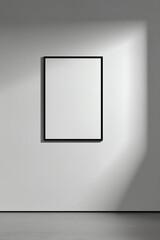 Photo of a large vertical black frame on a matte wall, perfectly straight-on angle, soft directional light, minimal and editorial style, clean and modern look.