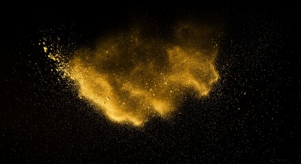 Golden dust explosion against black backdrop