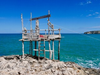 Trabucco, traditional wooden structure used for fishing in Southern Italy, at Spiagga Procinisco. Peschici, Puglia, Italy.