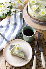 beautiful, appetizing mint cheesecake decorated with flowers