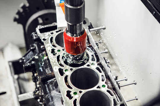 Diamond honing of engine on CNC machine. Cylinder boring engine machine. 