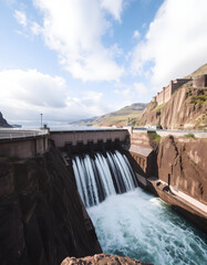 Obraz premium spectacular sight of the hydroelectric dam, powerful water surging through the massive lock gates, Dreamy. with white shades