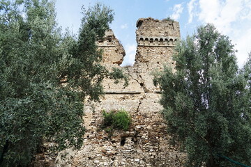 Ruins of an ancient castle in the abandoned medieval village of Oppido Vecchia in Aspromonte, Calabria, Italy.