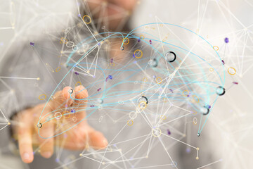 Abstract image of a hand interacting with a complex network, representing connection and technology.