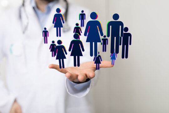 Image of a doctor's hand with digital icons representing a healthcare network or patient community. - Powered by Adobe