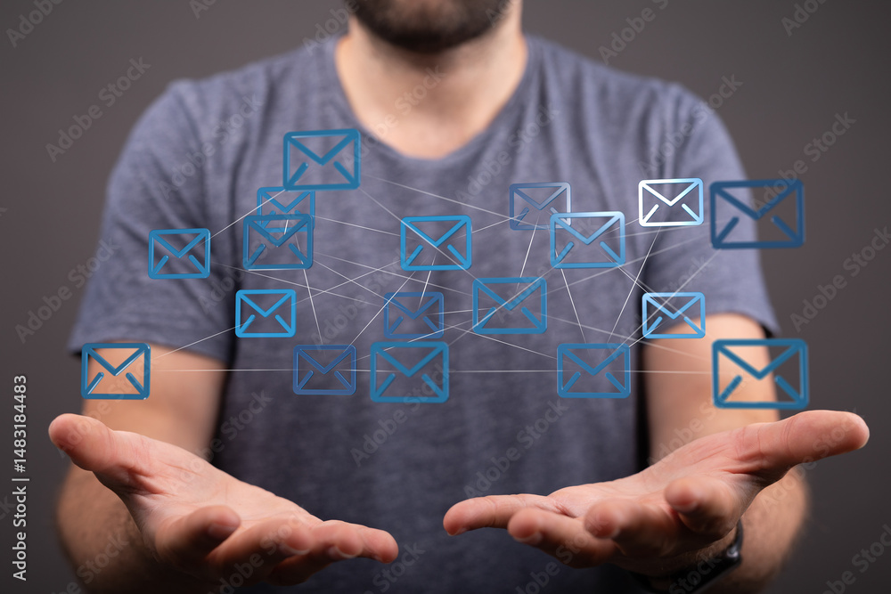 Poster Image of a man's hands holding a network of email icons, representing communication and connection.