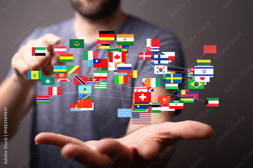 Poster man's hand displays interconnected flags, symbolizing international collaboration and global connect