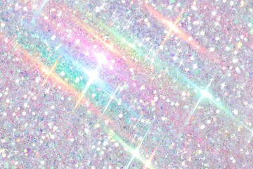 Dazzling iridescent glitter background with rainbow hues and sparkling highlights for a magical effect