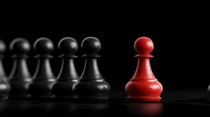 A single red pawn amidst a row of black pawns