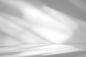 Obraz premium White Background Studio with sunlight light, shadow leaf on floor podium stage for editing product display,Room room interior with grey concrete wall texture with abstract sun light on floor cement