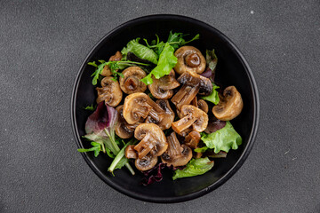 Champignon mushrooms pickled salad snack fresh gourmet food background on the table rustic food top view copy space vegetarian vegan food