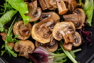 Champignon mushrooms pickled salad snack fresh gourmet food background on the table rustic food top view copy space vegetarian vegan food