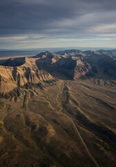 Naklejka premium Desert's Shadowed Embrace