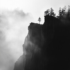 015-049-Clouds-129-_Silhouette_of_a_rugged_ridge_surrounded_b