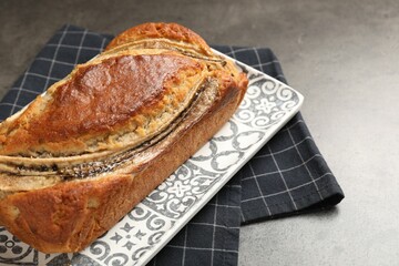 Delicious banana bread on grey table, closeup