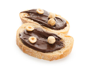 Slices of bread with chocolate spread and hazelnuts isolated on white