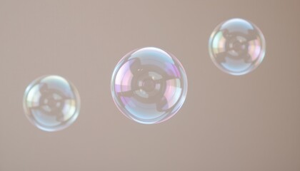 a trio of soap bubbles floating in front of a neutral backdrop, with one bubble perfectly in focus