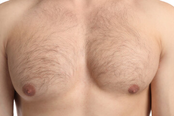 Young man with hairy chest, closeup. Epilation procedure