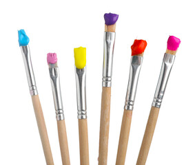 Brushes with different paints isolated on white