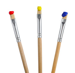 Fototapeta premium Brushes with different paints isolated on white