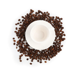 Ceramic cup with roasted coffee beans isolated on white, top view