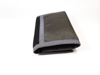 close up of a wallet made of polyester material on a white background