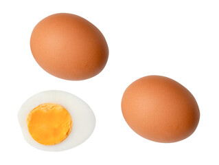 Top view set of raw brown chicken eggs and cooked or boiled chicken egg with egg yolk in half isolated with clipping path in png file format