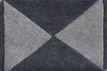 The image shows a contrast between the dark indigo blue surface and the lighter gray underside of...