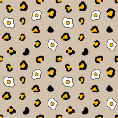 Leopard seamless pattern with fried eggs on brown background. Seamless texture for print, textile, fabric