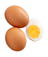 Top view of raw brown chicken eggs and cooked or boiled chicken egg with egg yolk in half isolated with clipping path in png file format