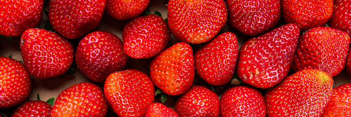 Strawberries fresh berries ripe red sweet fruit dessert dish delicious gourmet food background on the table rustic food top view copy space keto and paleo diet vegetarian and vegan food