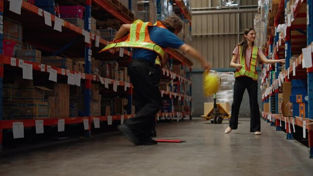 Warehouse workers are dancing happily after a successful job.
