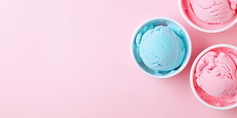 Pink and blue ice cream scoops in white bowls on pink background. Summer dessert and sweet treat concept. Image for confectionery menu. Banner with copy space