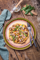 Vegetarian fritatta with mushrooms, onions and  arugula