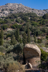 anti pirate stone house with giant boulder roof, Ikaria, Greece