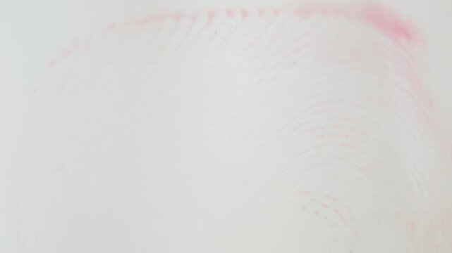 Macro Shot Drop of Blood Fingerprint on a Glass Evidence Lab