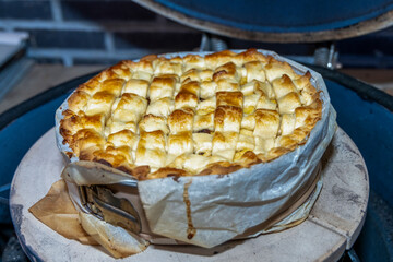 Apple pie in a springform pan on the barbecue, pie, pastry, treats, dessert, baking, cooking