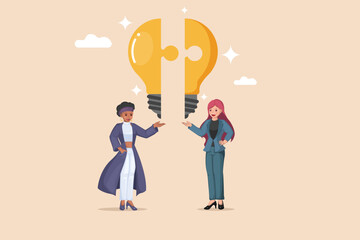 Combining Ideas for Innovation. Two Businesswomen Connecting Puzzle Pieces to Form a Bright Light Bulb.